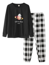 Women's Cartoon Astronaut Pajama Set: Round Neck Cotton Top & Cuffed Check Pants