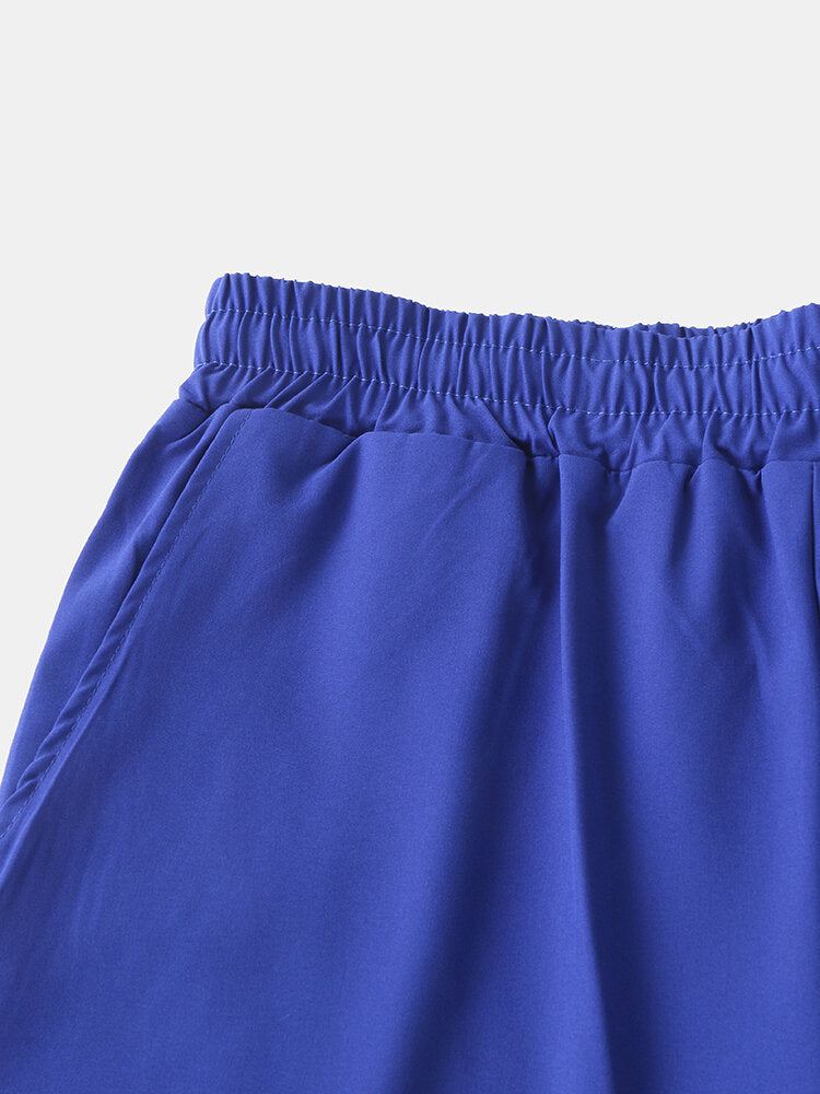 Men Solid Color Quick Dry Sports Running Casual Stretch Double Layered Board Shorts