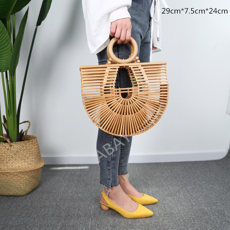 new Women's bamboo handbag Bohemia holiday beach bag Women's hollow woven rattan bag