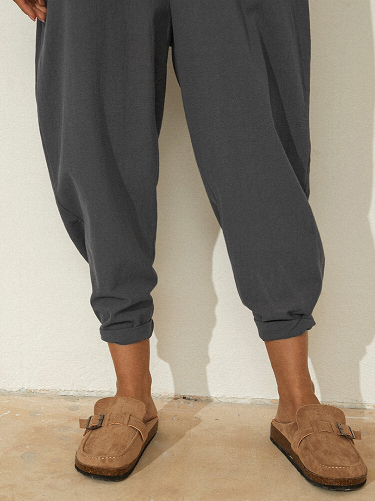 Solid Color Long Sleeve Notched Collar Pocket Loose Jumpsuit For Women