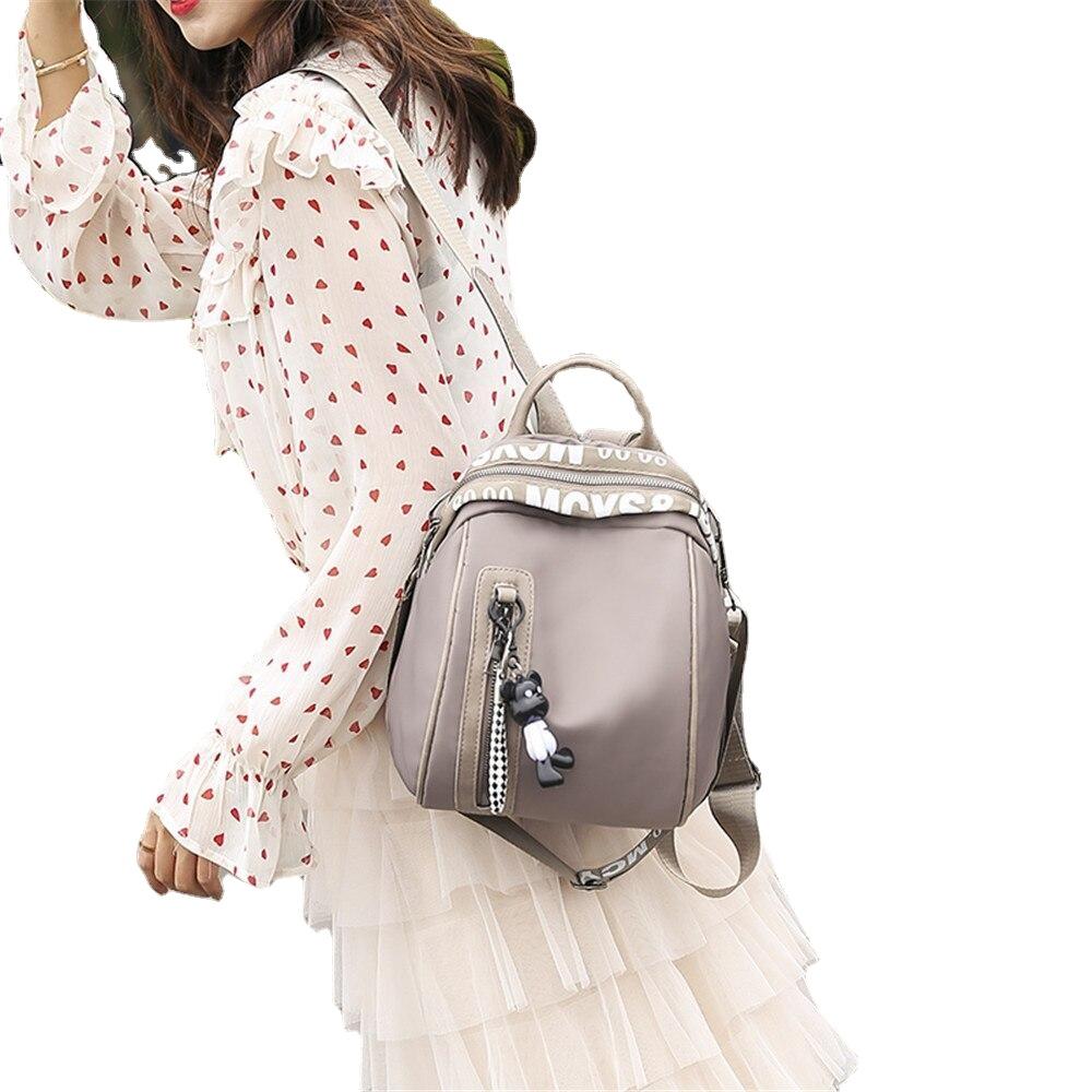 Multifunctional Waterproof Women's Zippered Nylon Backpack With Small Pendant